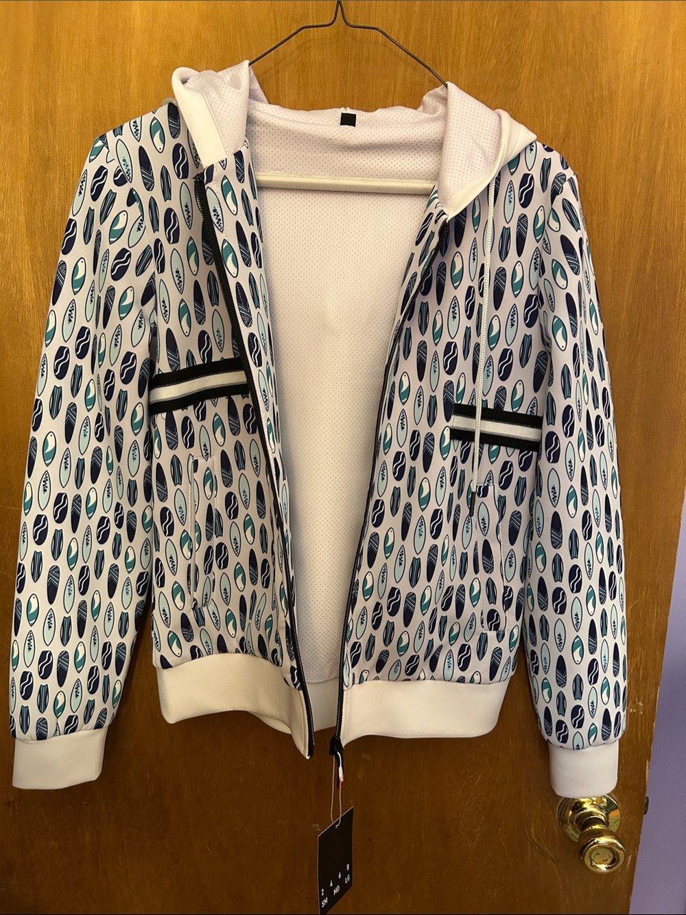 Woman’s small Shakakai surfboard hoodie